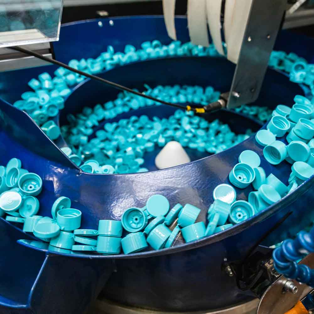 Berry plastic caps in production process